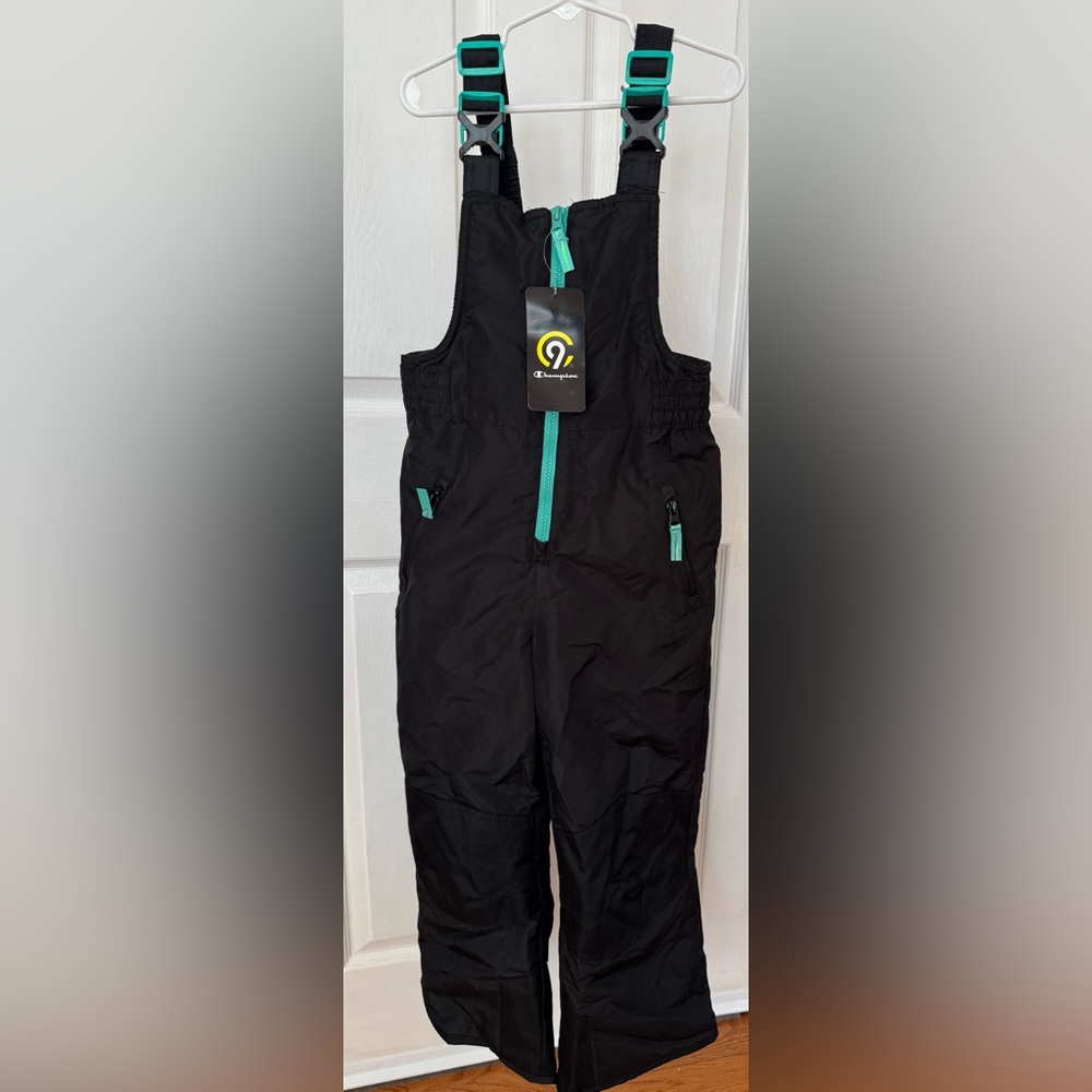 Girls Champion snow bibs. Black and Teal.
